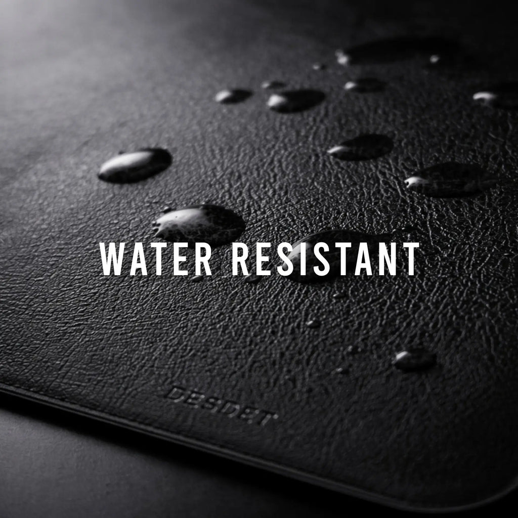 Black surface with water droplets and 'WATER RESISTANT' text, brand 'DESSINI' visible.