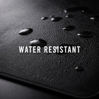 Black surface with water droplets and 'WATER RESISTANT' text, brand 'DESSINI' visible.